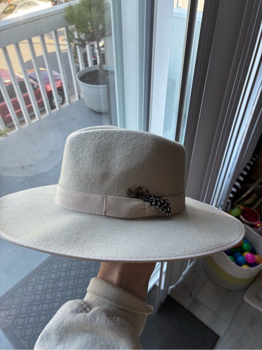 Cream Wide-Brim Felt Hat with Grosgrain Band and Feather Accent